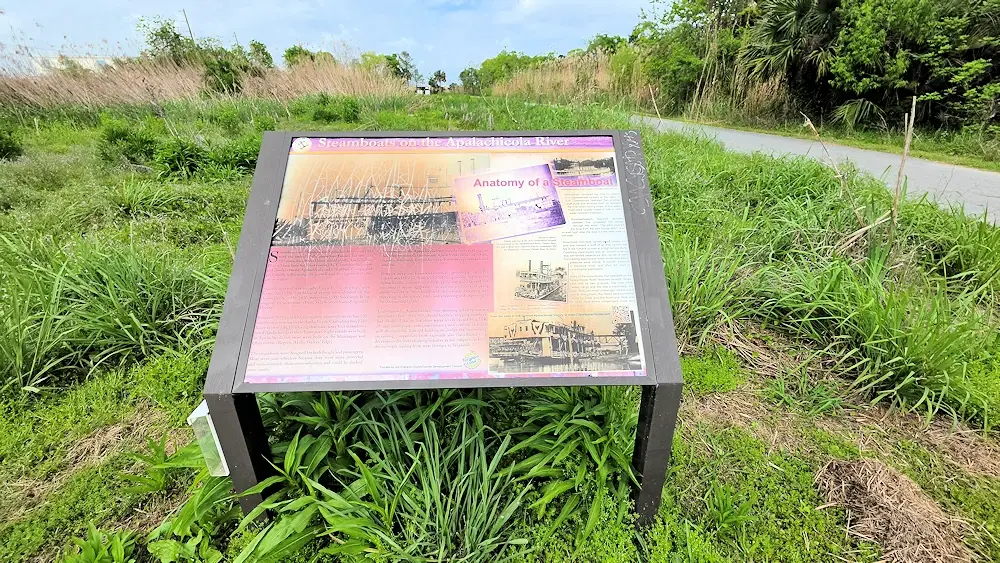 Historical marker about steamboats on the river.