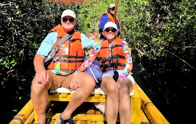 On the raft with our guide going through the Mangrove trees.