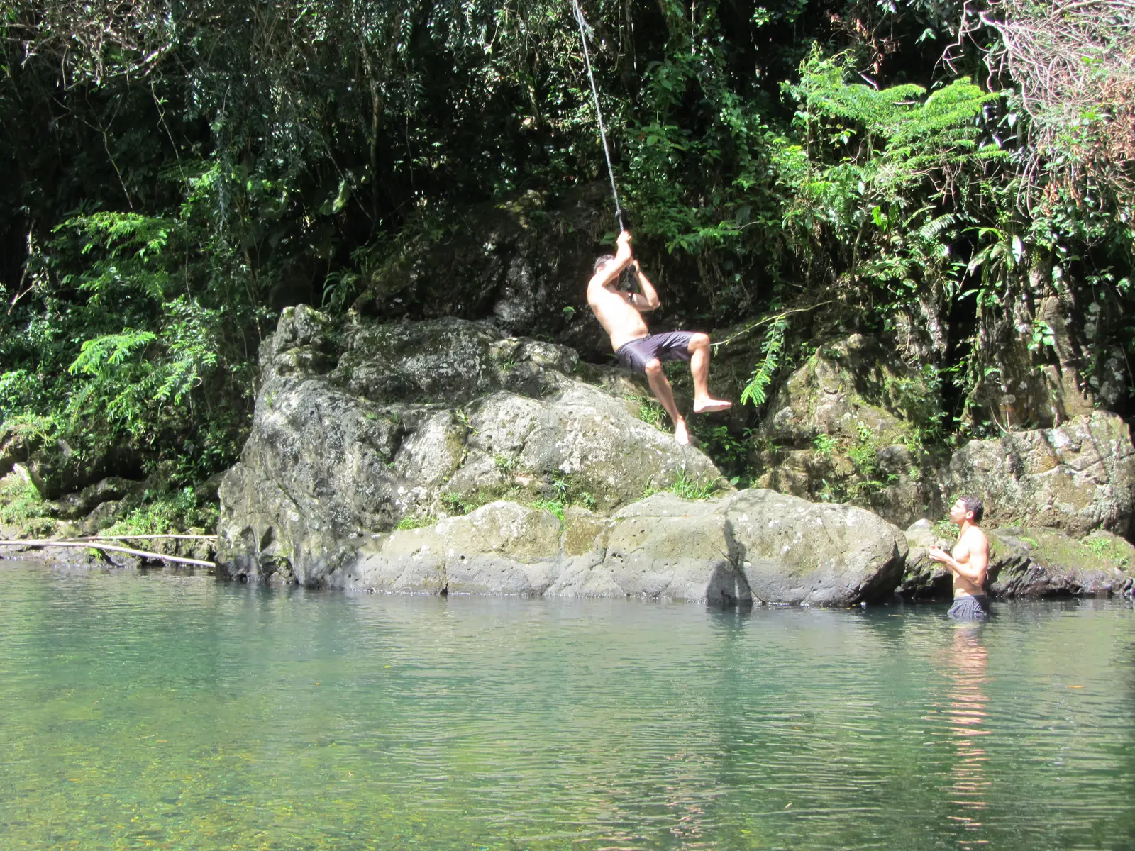Swimming in the river at the Carabali Rainforest Park 