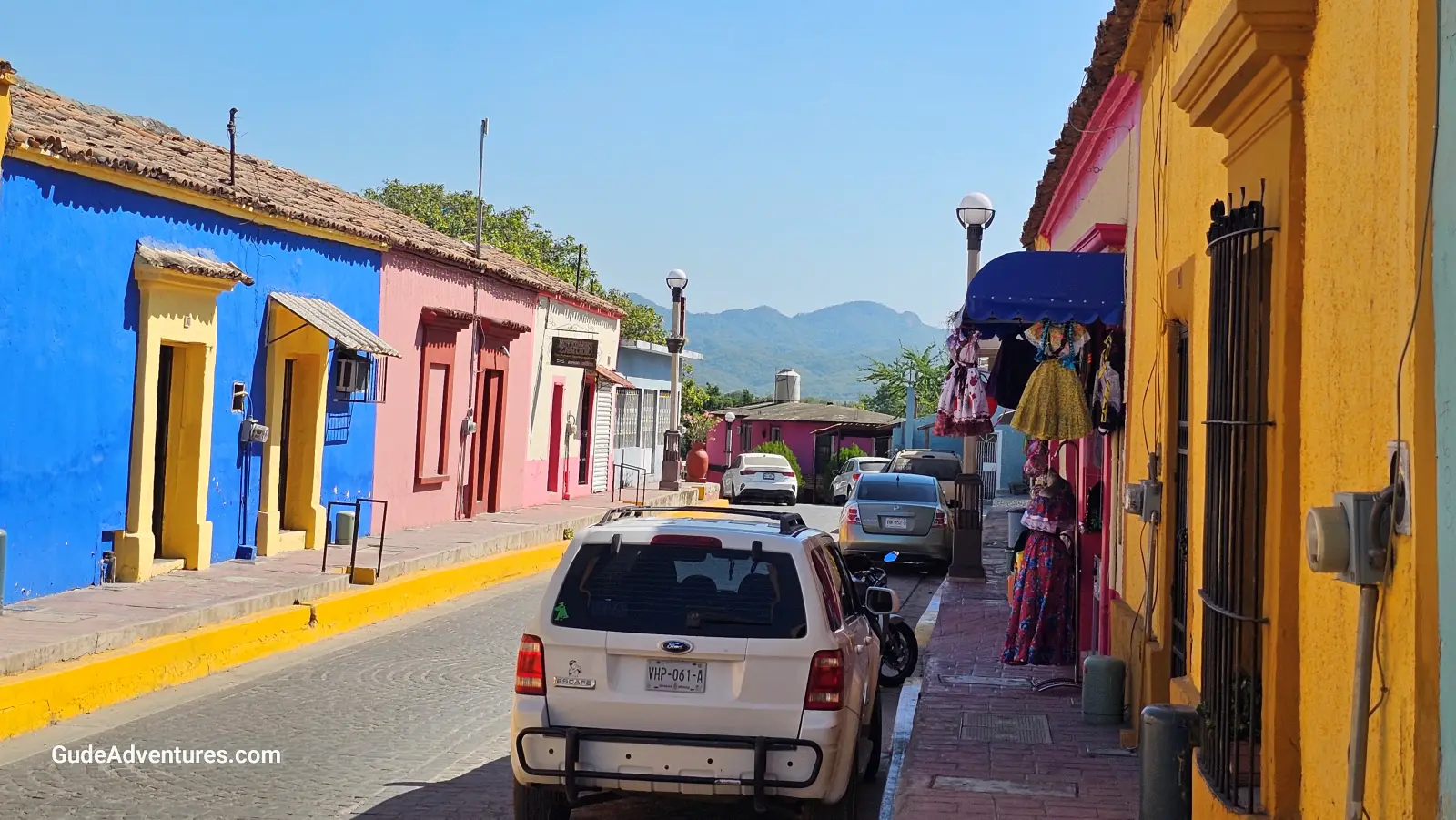 Street in Concordia with Sierra Madre mountains in the distance