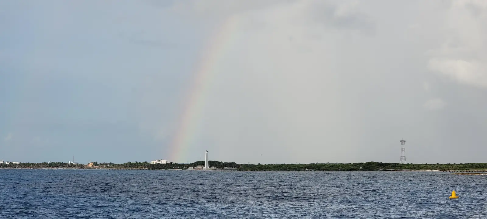 Rainbow over the Mahahual lighthouse.