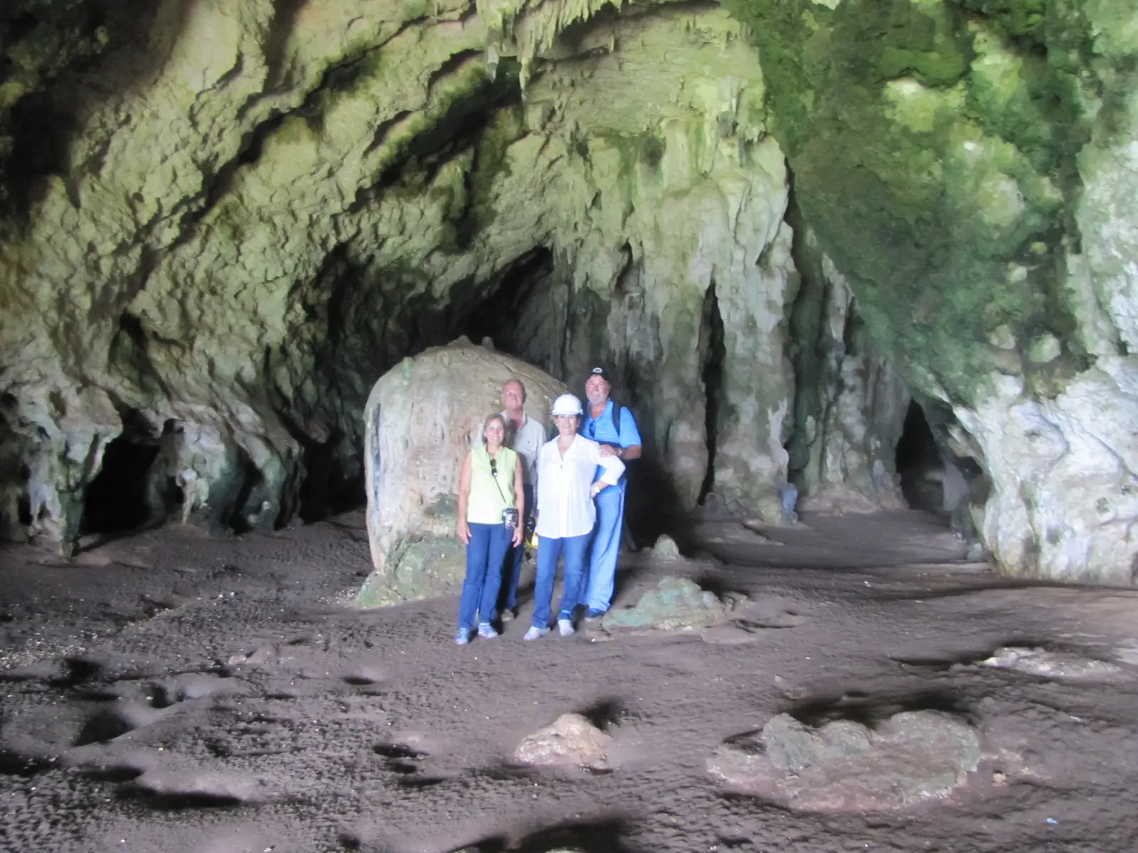 Stalactites and a large stalagmite in Cueva Ventana.