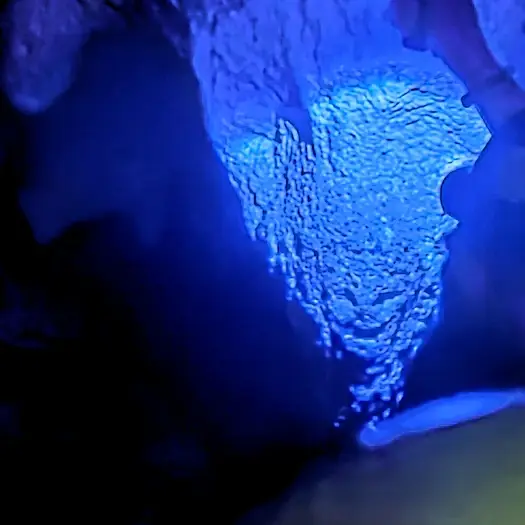 Smiling petroglyph in the Light Cave.