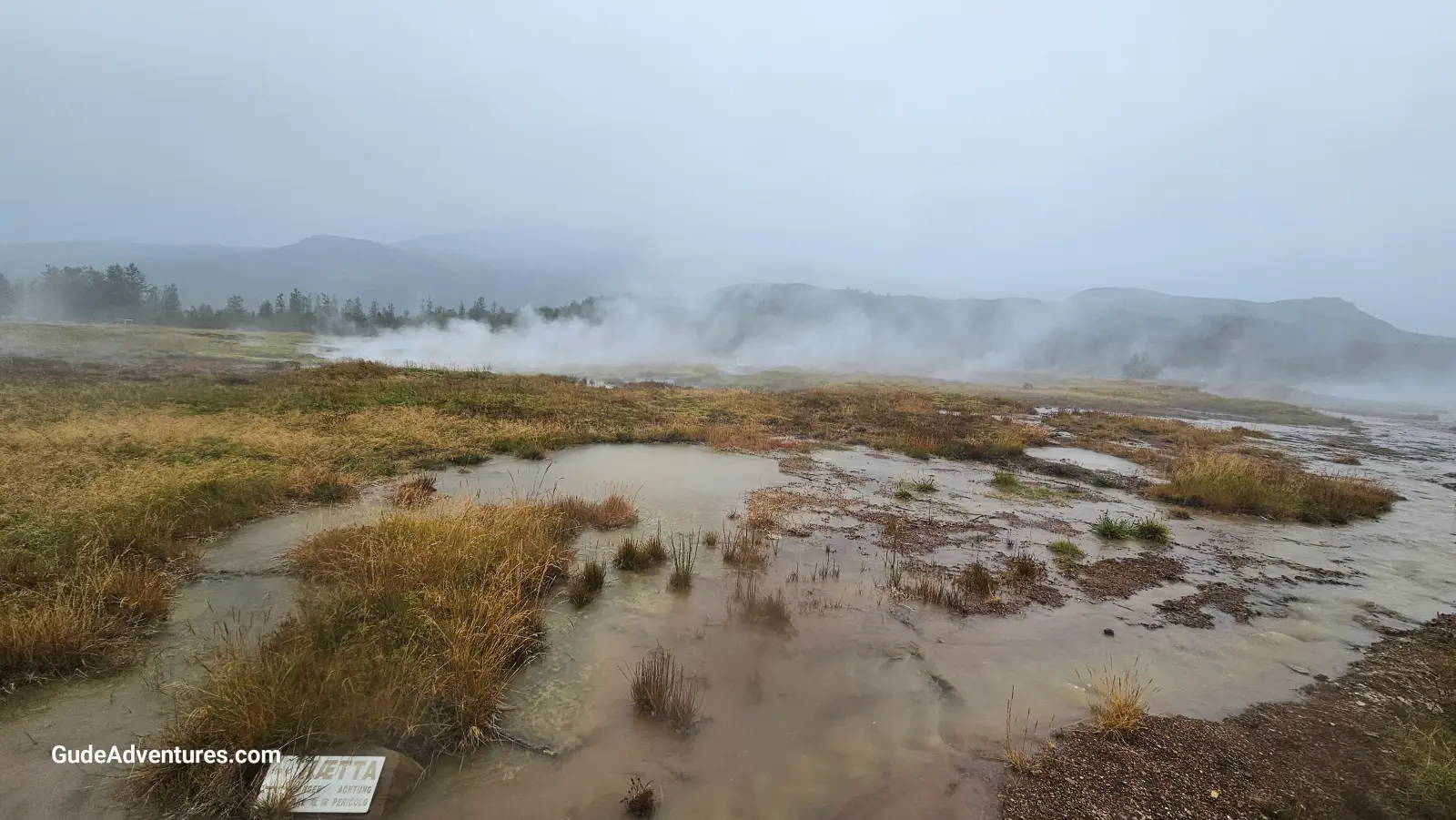 The Haukadalur area is filled with a variety of geothermal features, including boiling mud pools, steam vents, and small hot springs.