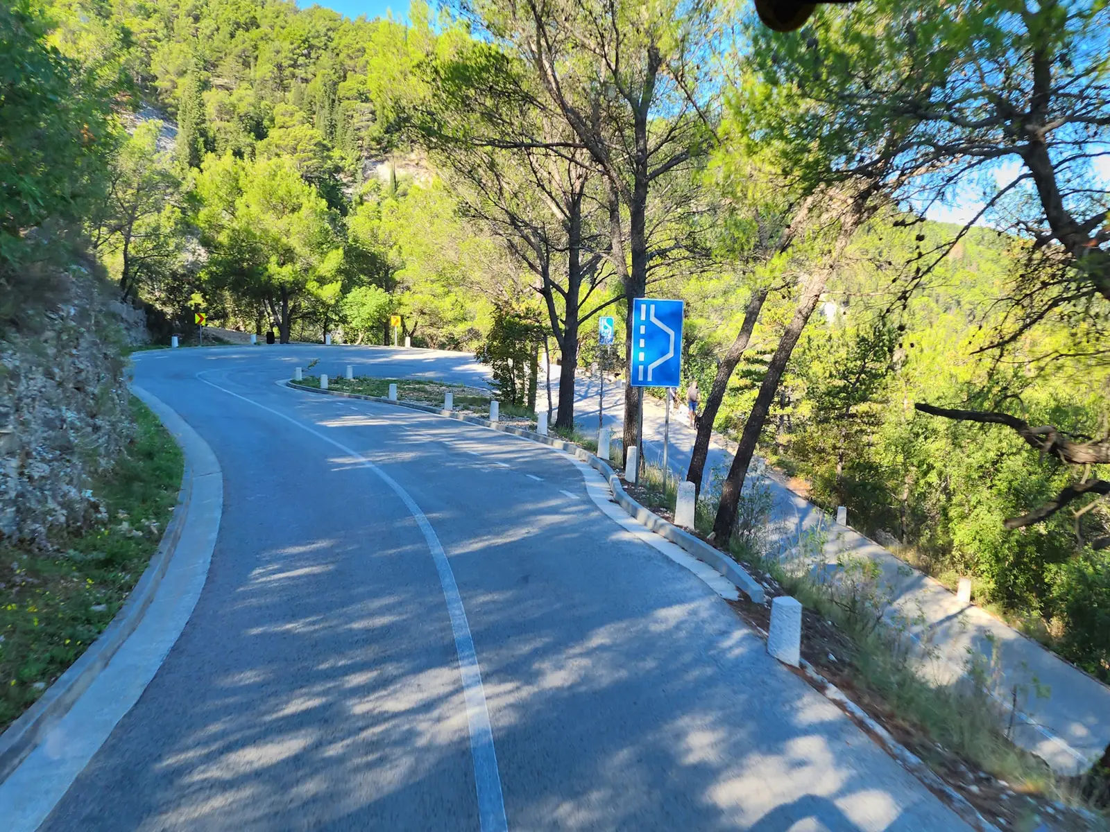 The road in the park to the waterfalls has several hair pin turns.