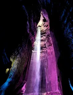 Ruby Falls lighted up in purple