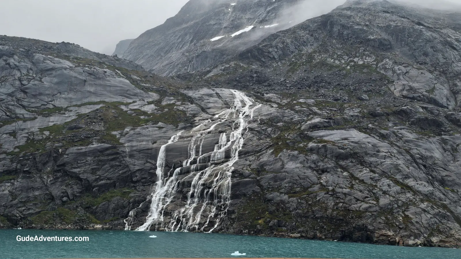 Large waterfall in the fjord
