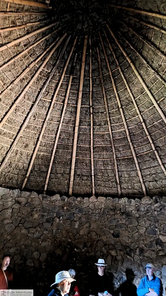 Inside one of the storehouses (qollqas) with a reconstructed roof