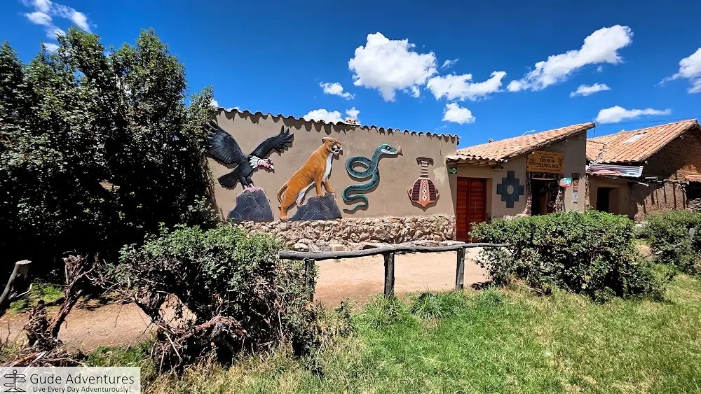 Condor, Puma, and Snake mural in the village