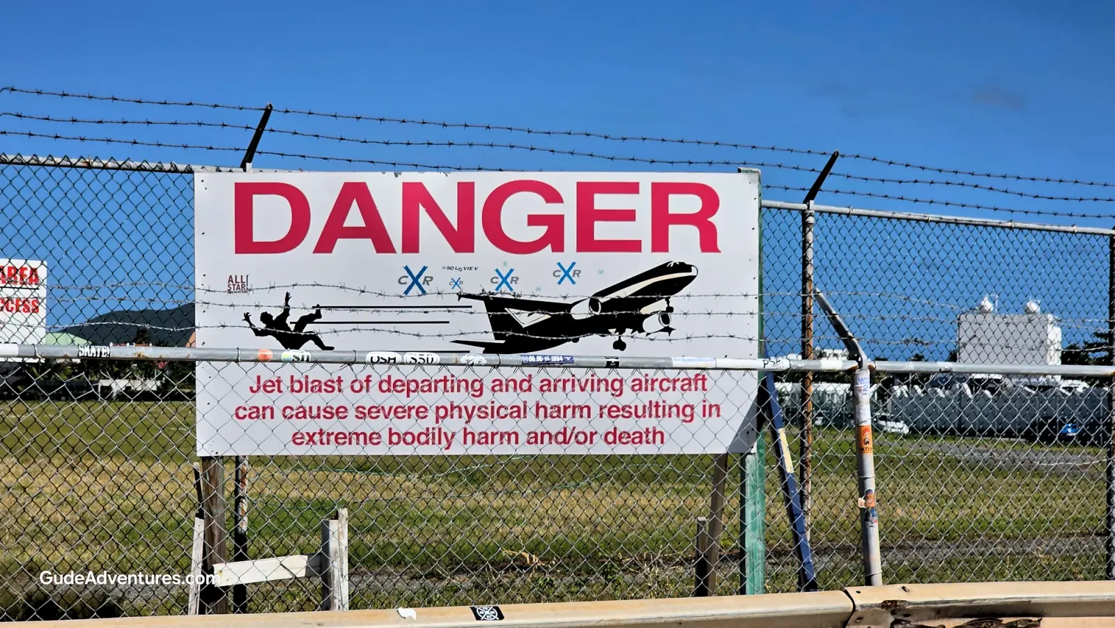 Airport warning sign at Maho Beach 