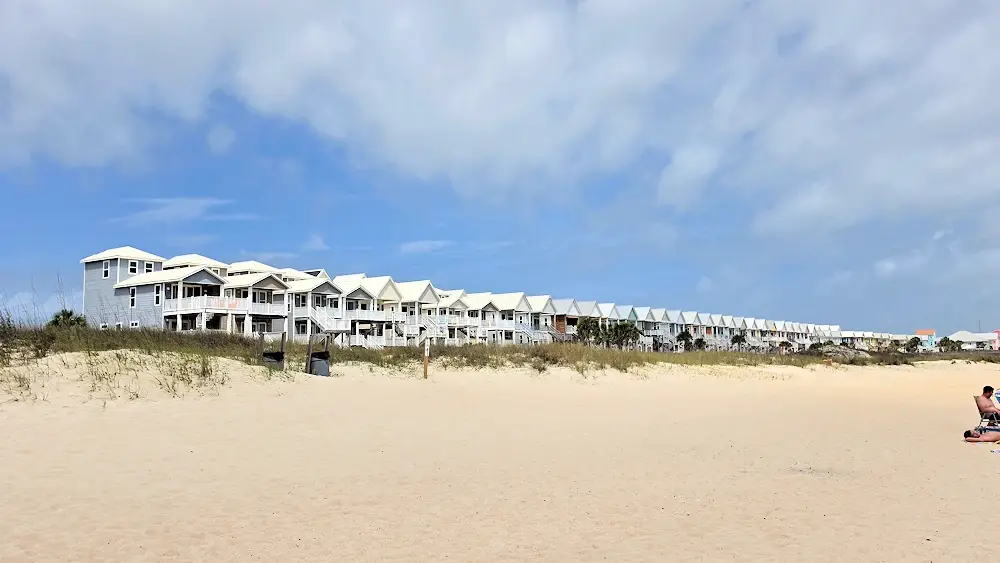 Multi-color houses along the beach.
