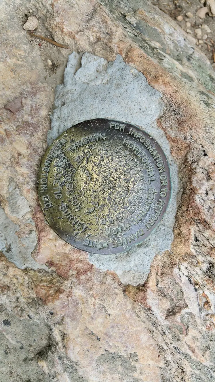 Surveyor mark on the top of Sugarloaf Mountain 
