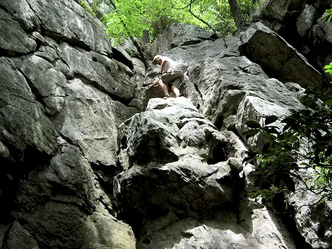 Climbing the rock face of Sugarloaf Mountain 