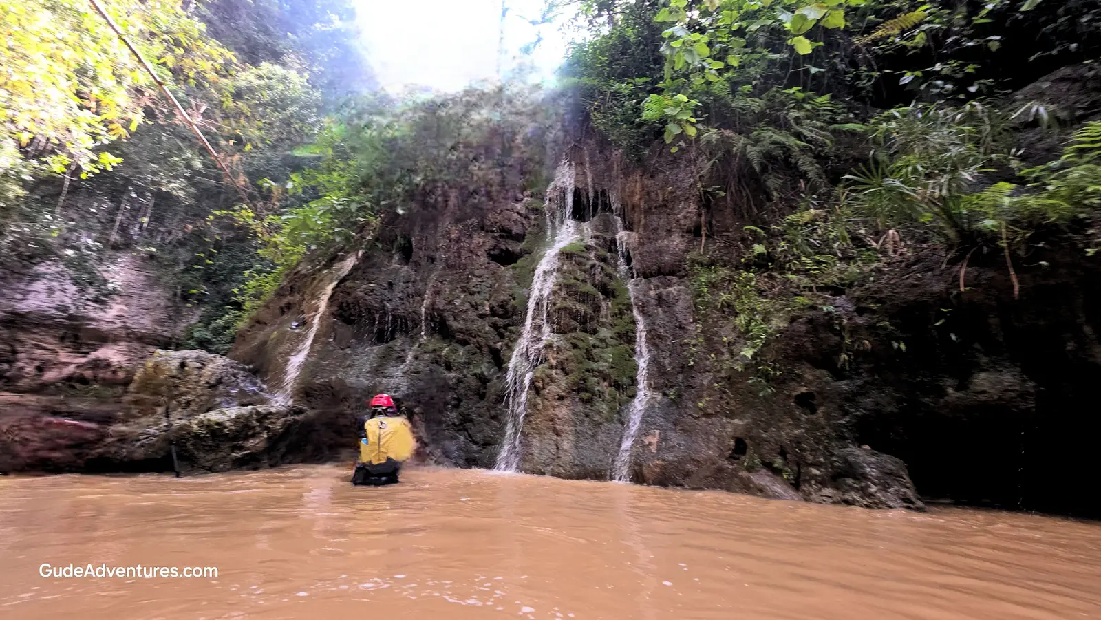 Tanama River waterfalls. One of them is fed by a hot spring.