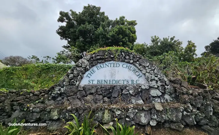 View of the entrance sign for the St. Benedict’s Painted Church 