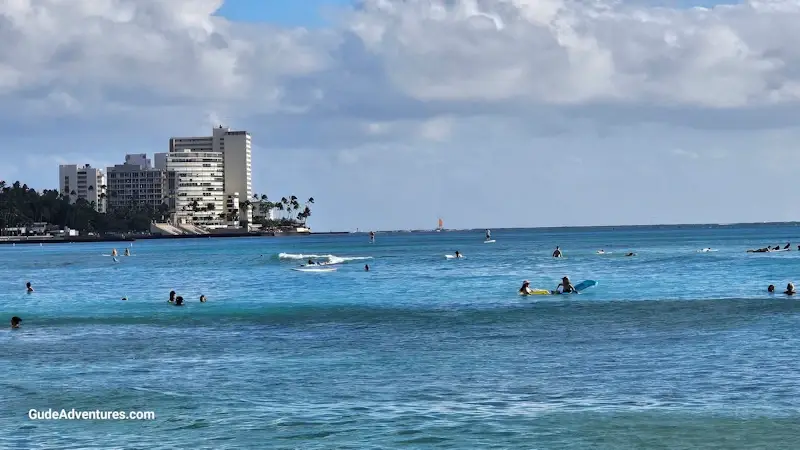 Surfers at Waikiki Beach